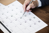 businessman-marking-calendar-appointment
